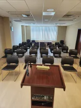 Room is set up with chairs auditorium style